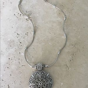 New!!!  Never been used!!!  Round charm necklace!